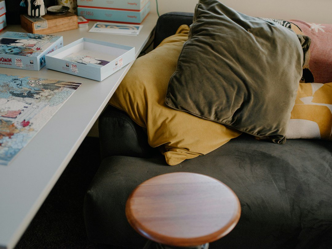 Cozy modern lounge with soft oversized seating and pillows